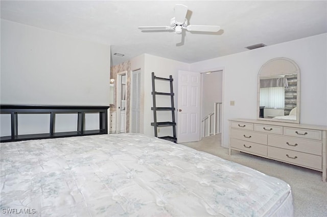 27910 Hacienda E Blvd Unit 201B, Bonita Springs, FL 34135 - bedroom featuring a ceiling fan and light colored carpet
