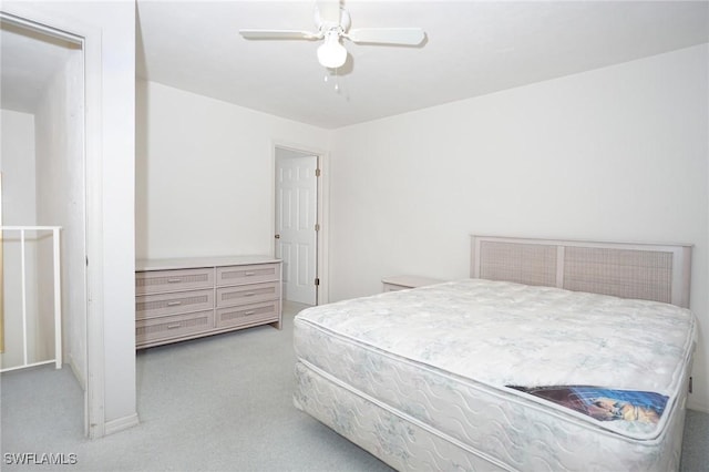 27910 Hacienda E Blvd Unit 201B, Bonita Springs, FL 34135 - bedroom with light carpet and a ceiling fan