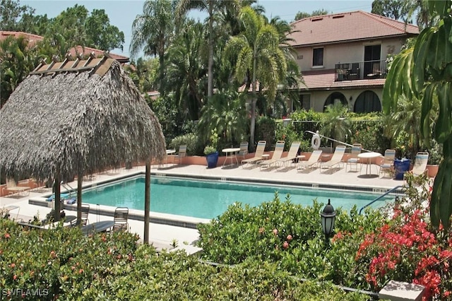 27910 Hacienda E Blvd Unit 201B, Bonita Springs, FL 34135 - community pool with a patio area