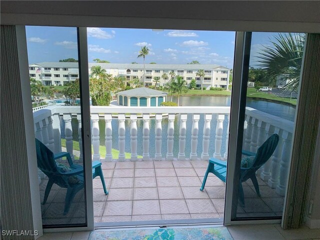 13511 Stratford Place Cir Unit 305, Fort Myers, FL 33919 - balcony with a water view