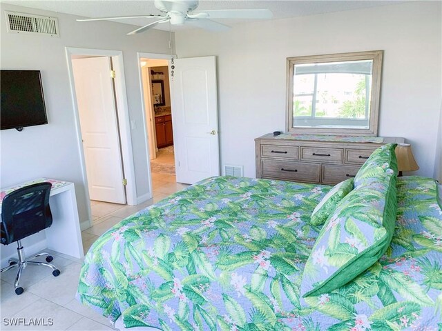 13511 Stratford Place Cir Unit 305, Fort Myers, FL 33919 - bedroom with light tile patterned floors and a ceiling fan