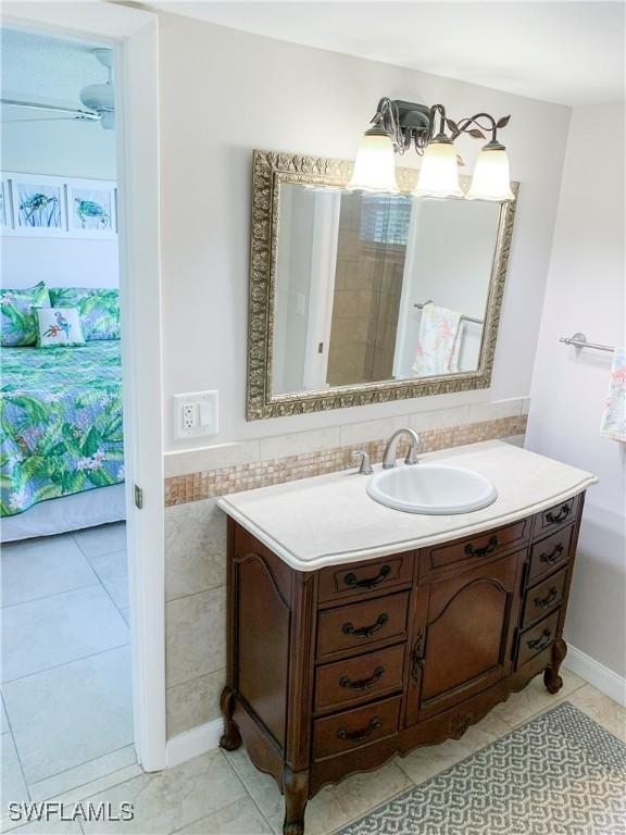 13511 Stratford Place Cir Unit 305, Fort Myers, FL 33919 - ensuite bathroom featuring vanity and tile patterned flooring