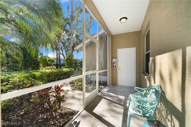 784 Carrick Bend Cir Unit 103, Naples, FL 34110 - property entrance featuring stucco siding
