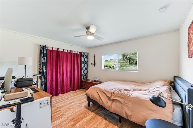 4665 47th Ave NE, Naples, FL 34120 - bedroom featuring wood finished floors and a ceiling fan