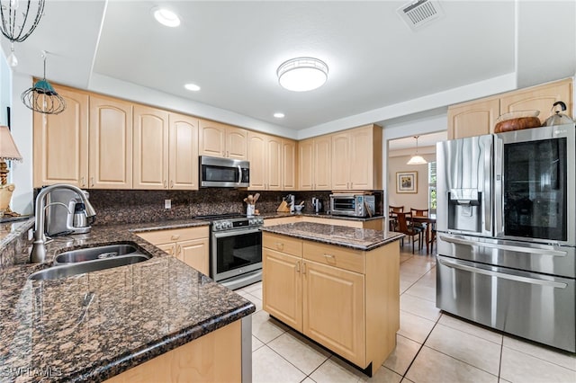 4665 47th Ave NE, Naples, FL 34120 - kitchen with appliances with stainless steel finishes, a sink, light brown cabinets, and recessed lighting