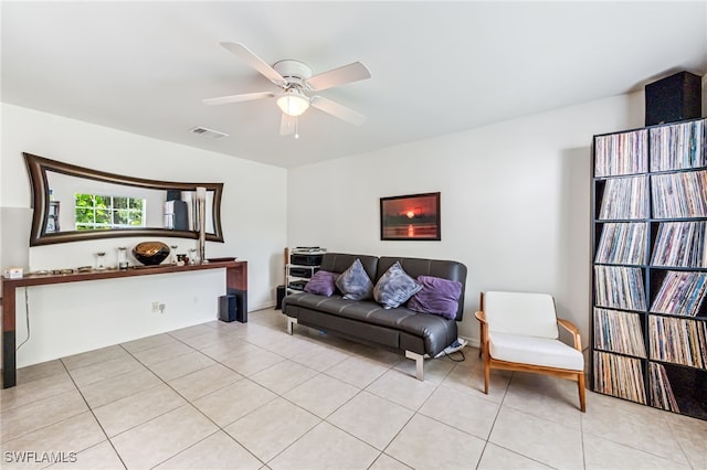 4665 47th Ave NE, Naples, FL 34120 - living area featuring light tile patterned flooring and a ceiling fan
