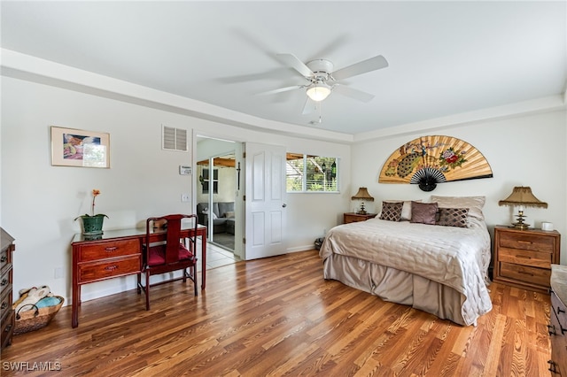 4665 47th Ave NE, Naples, FL 34120 - bedroom with light wood-style flooring, ceiling fan, and baseboards