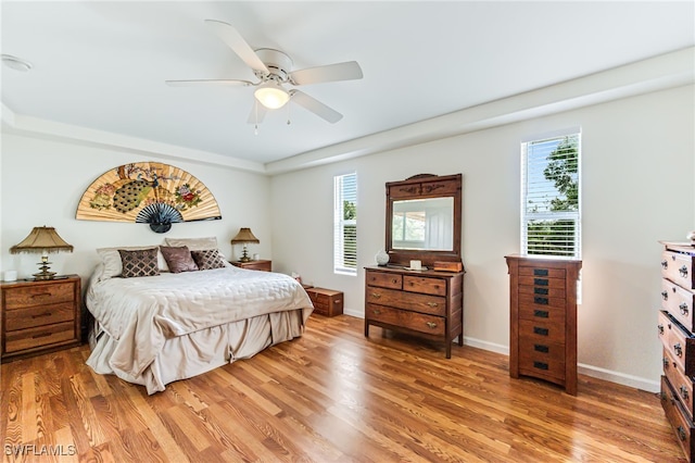 4665 47th Ave NE, Naples, FL 34120 - bedroom featuring light wood-type flooring, ceiling fan, and baseboards