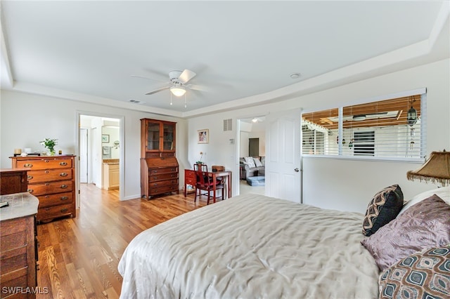 4665 47th Ave NE, Naples, FL 34120 - bedroom featuring light wood-style floors and a ceiling fan