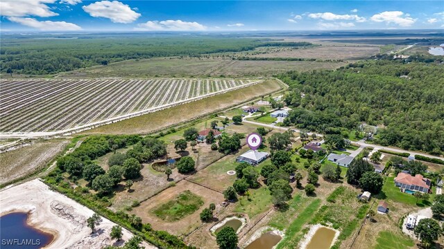 4665 47th Ave NE, Naples, FL 34120 - aerial view of property and surrounding area with rural landscape and a heavily wooded area