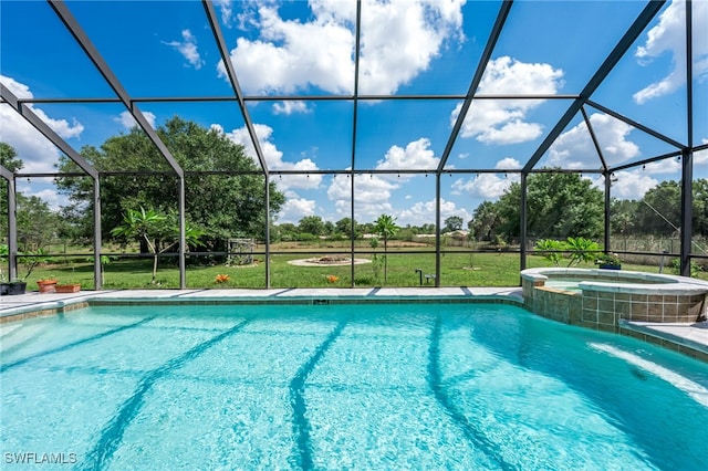 4665 47th Ave NE, Naples, FL 34120 - view of swimming pool with a pool with connected hot tub and a lanai