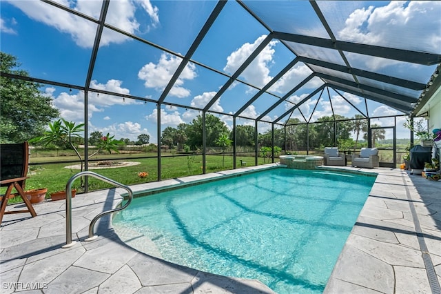 4665 47th Ave NE, Naples, FL 34120 - view of pool with a patio, a lawn, a pool with connected hot tub, and glass enclosure