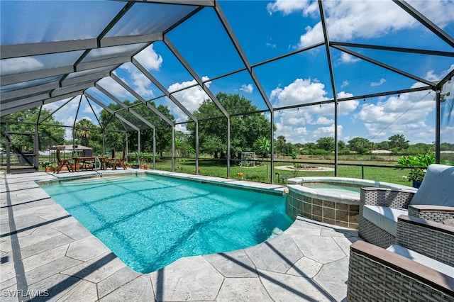 4665 47th Ave NE, Naples, FL 34120 - view of swimming pool with a patio area, a lanai, a pool with connected hot tub, and view of scattered trees