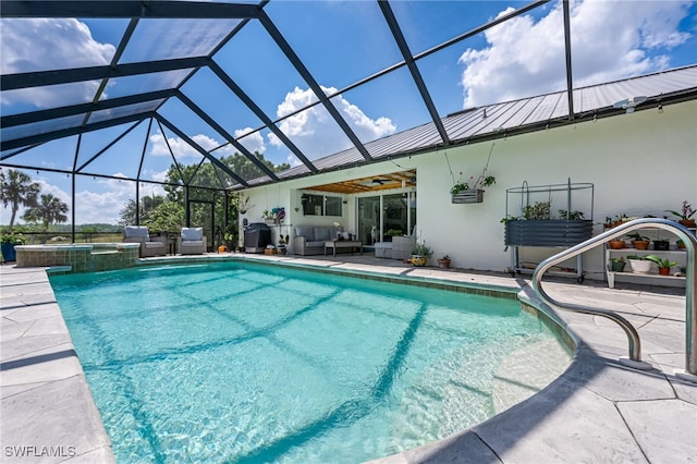 4665 47th Ave NE, Naples, FL 34120 - view of swimming pool featuring an outdoor hangout area, a patio, a pool with connected hot tub, and glass enclosure