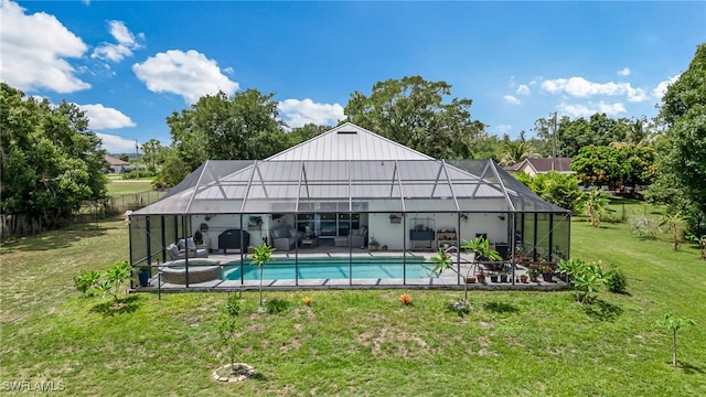 4665 47th Ave NE, Naples, FL 34120 - back of house featuring a patio area, glass enclosure, a pool with connected hot tub, and outdoor lounge area