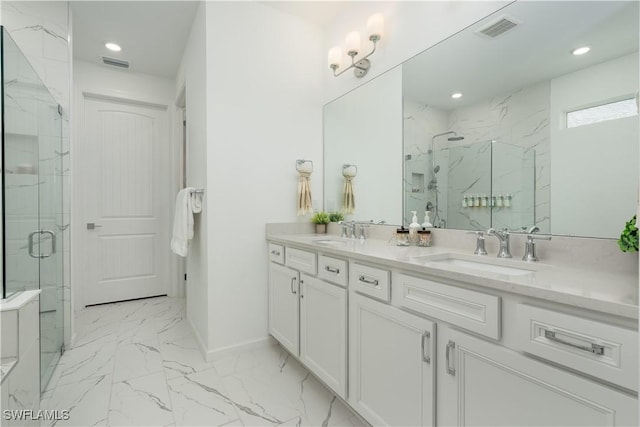 42530 Atlas Dr, Punta Gorda, FL 33982 - full bathroom featuring marble finish flooring, a marble finish shower, double vanity, baseboards, and recessed lighting