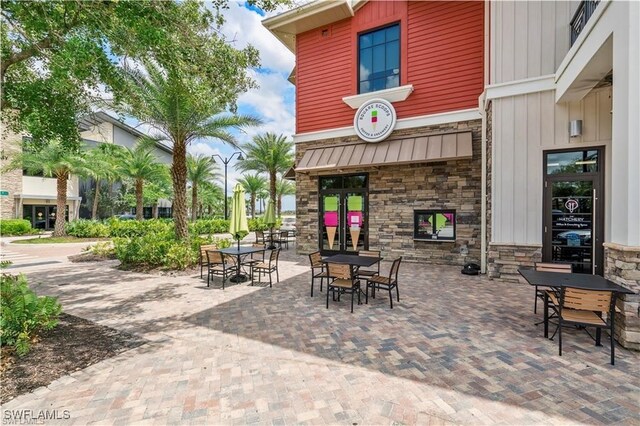 42530 Atlas Dr, Punta Gorda, FL 33982 - view of patio / terrace featuring outdoor dining area