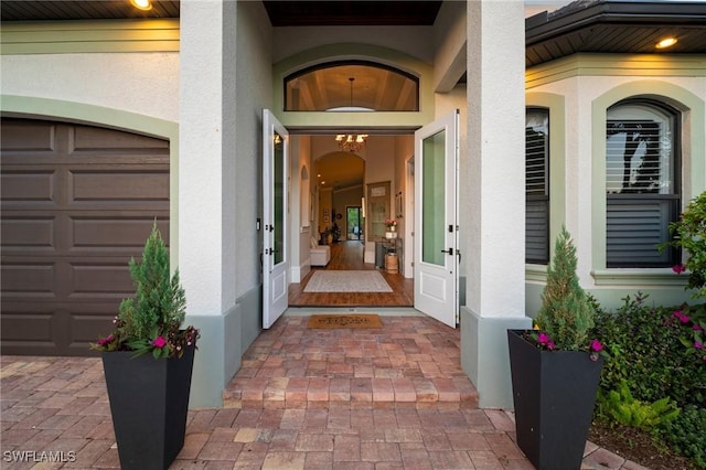 10340 Vanderbilt Dr, Naples, FL 34108 - property entrance featuring stucco siding and french doors