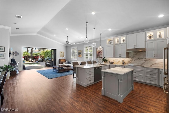 10340 Vanderbilt Dr, Naples, FL 34108 - kitchen with gray cabinets, open floor plan, under cabinet range hood, a peninsula, and a sink