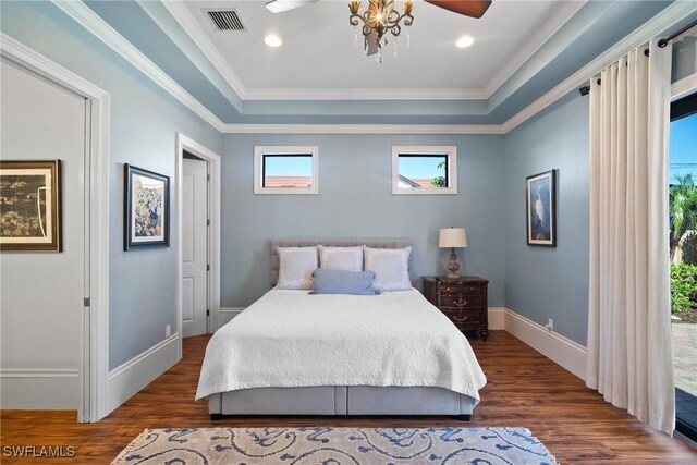 10340 Vanderbilt Dr, Naples, FL 34108 - bedroom featuring dark wood-style flooring, a tray ceiling, crown molding, baseboards, and access to outside