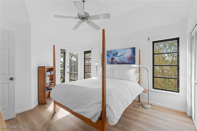 3627 Clipper Ln, Saint James City, FL 33956 - bedroom featuring wood finished floors, baseboards, access to outside, and ceiling fan
