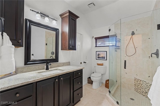 3627 Clipper Ln, Saint James City, FL 33956 - bathroom with vanity, a stall shower, toilet, tile patterned floors, and lofted ceiling