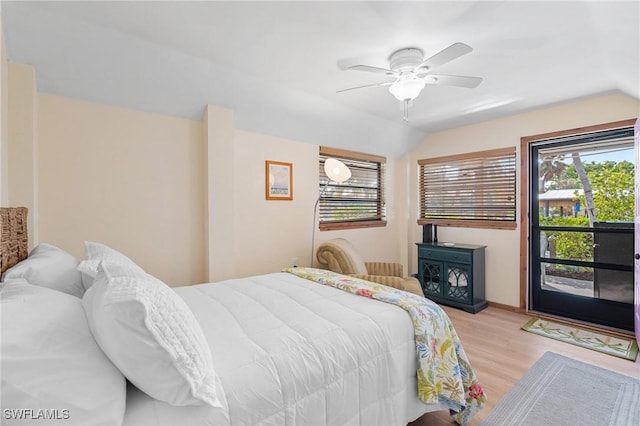 3627 Clipper Ln, Saint James City, FL 33956 - bedroom featuring wood finished floors, ceiling fan, and vaulted ceiling