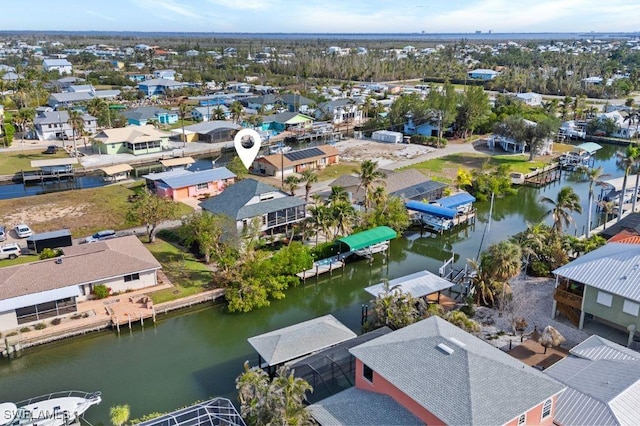 3627 Clipper Ln, Saint James City, FL 33956 - aerial view of residential area featuring a large body of water