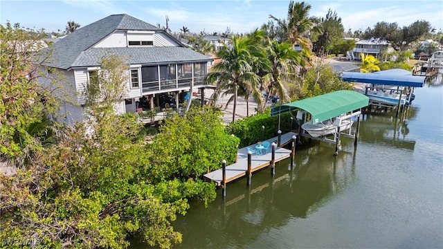3627 Clipper Ln, Saint James City, FL 33956 - dock with boat lift and a water view