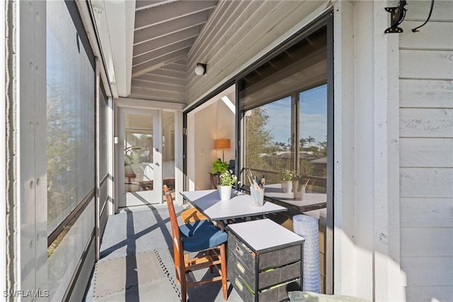3627 Clipper Ln, Saint James City, FL 33956 - sunroom / solarium with healthy amount of natural light and outdoor dining area