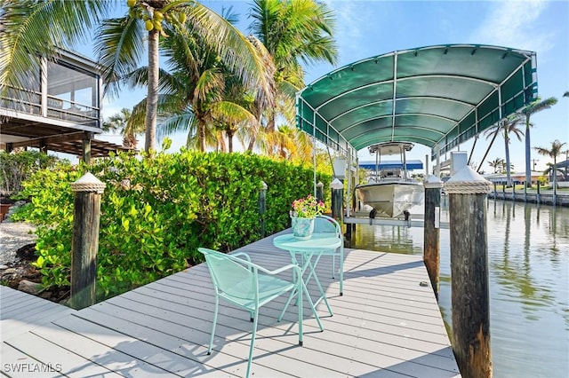 3627 Clipper Ln, Saint James City, FL 33956 - dock with boat lift and a water view