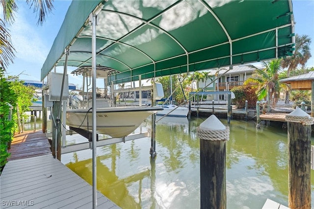 3627 Clipper Ln, Saint James City, FL 33956 - dock area featuring boat lift and a water view
