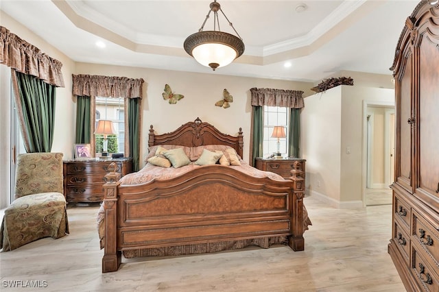 28686 San Galgano Way, Bonita Springs, FL 34135 - bedroom with a raised ceiling, multiple windows, light wood-type flooring, crown molding, and recessed lighting