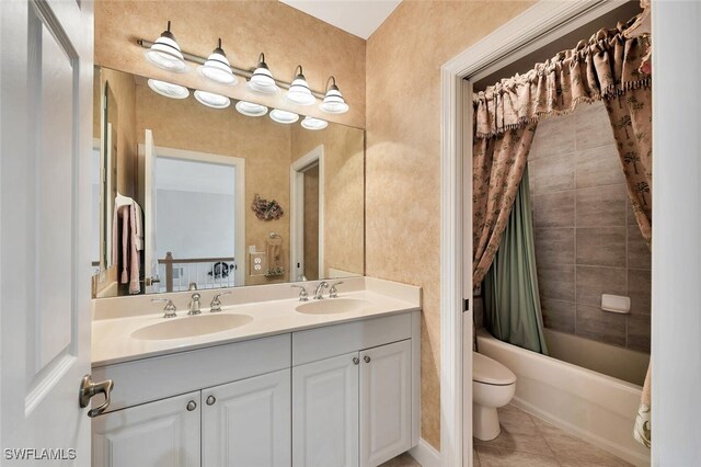 28686 San Galgano Way, Bonita Springs, FL 34135 - bathroom with double vanity, toilet, tile patterned floors, and shower / bath combo