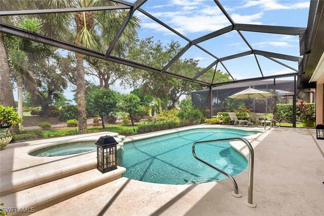 28686 San Galgano Way, Bonita Springs, FL 34135 - outdoor pool with an in-ground hot tub, a patio, and a lanai