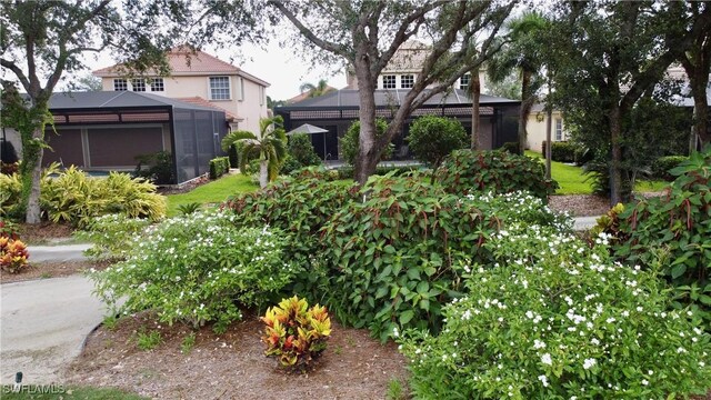 28686 San Galgano Way, Bonita Springs, FL 34135 - view of yard with a lanai