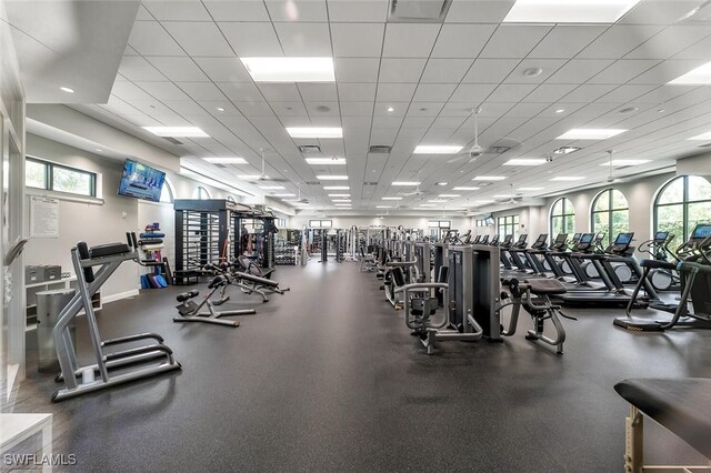 28686 San Galgano Way, Bonita Springs, FL 34135 - exercise room with a paneled ceiling