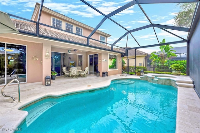 28686 San Galgano Way, Bonita Springs, FL 34135 - view of swimming pool with a patio, a pool with connected hot tub, a lanai, and outdoor dining space