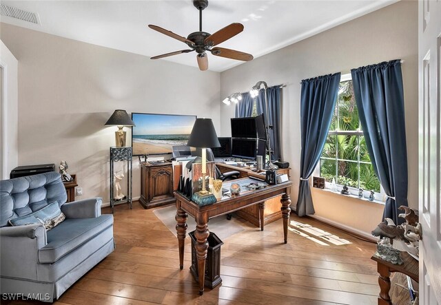 28686 San Galgano Way, Bonita Springs, FL 34135 - office area with a ceiling fan, hardwood / wood-style flooring, and baseboards