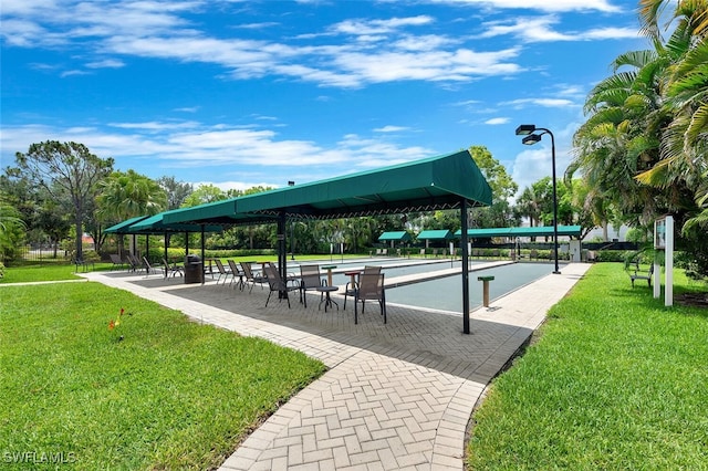 28686 San Galgano Way, Bonita Springs, FL 34135 - view of property's community featuring a game area and a lawn