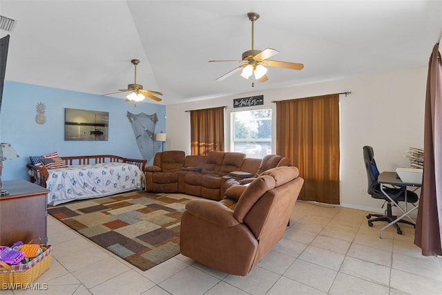 718 Willard Ave, Lehigh Acres, FL 33972 - living area with a ceiling fan, vaulted ceiling, light tile patterned floors, and a desk