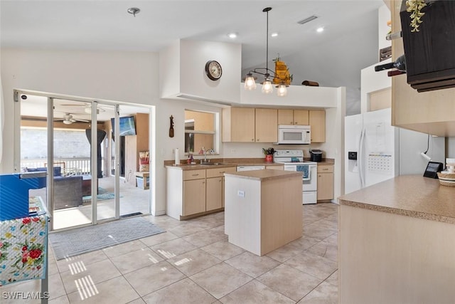 718 Willard Ave, Lehigh Acres, FL 33972 - kitchen with white appliances, high vaulted ceiling, a sink, a center island, and light brown cabinets