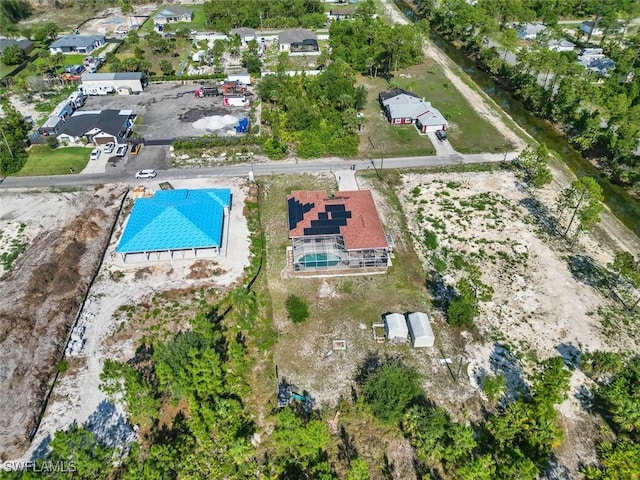 718 Willard Ave, Lehigh Acres, FL 33972 - drone / aerial view of a pool