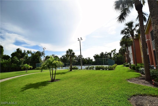 6481 Aragon Way Unit 205, Fort Myers, FL 33966 - view of home's community featuring a lawn and a water view