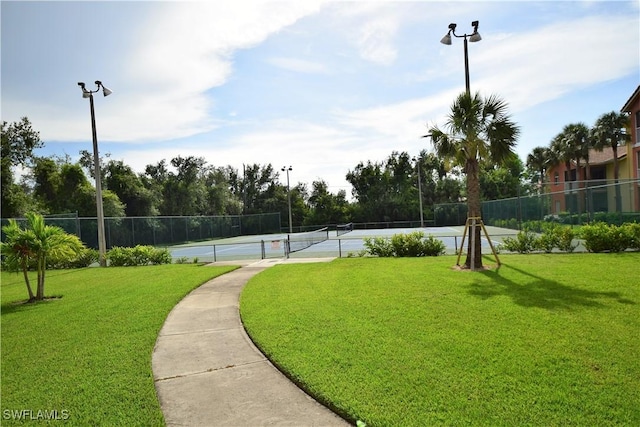 6481 Aragon Way Unit 205, Fort Myers, FL 33966 - view of property's community featuring a tennis court