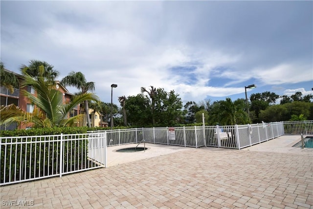 6481 Aragon Way Unit 205, Fort Myers, FL 33966 - view of property's community with a patio area