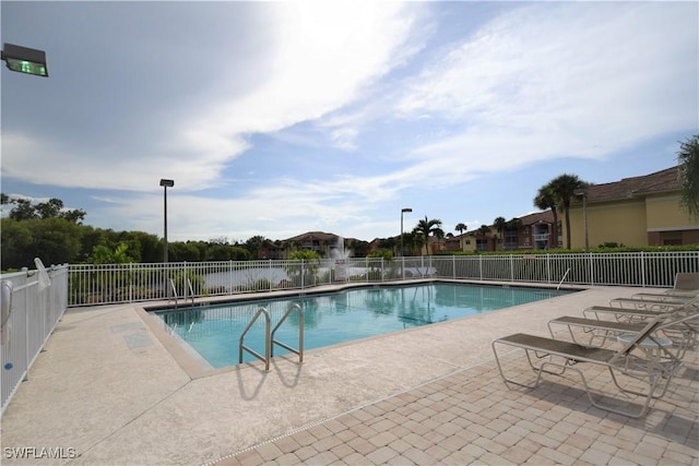 6481 Aragon Way Unit 205, Fort Myers, FL 33966 - community pool with a patio