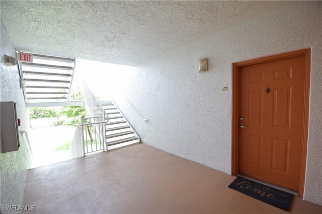 6481 Aragon Way Unit 205, Fort Myers, FL 33966 - property entrance with stucco siding