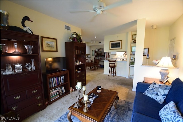 6481 Aragon Way Unit 205, Fort Myers, FL 33966 - living room with carpet and a ceiling fan