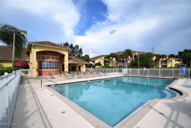 6481 Aragon Way Unit 205, Fort Myers, FL 33966 - community pool featuring a patio